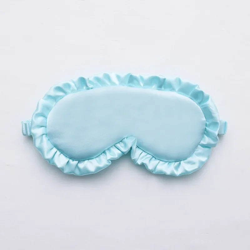 Masque de sommeil en soie à volants élégants