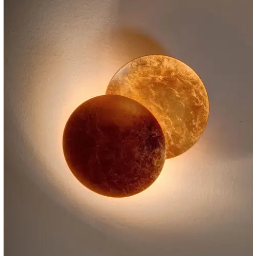 Design-Wandleuchte in eleganter Eclipse-Form